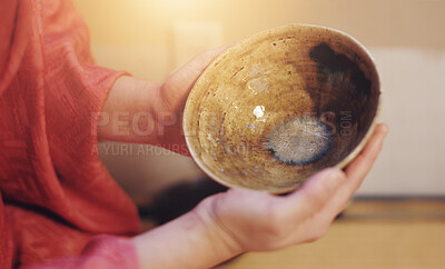 Buy stock photo Hands, japanese bowl and tea ceremony preparation for cultural hospitality, custom utensil and heritage. Closeup, person and empty ceramic chawan for traditional ritual and matcha drink process