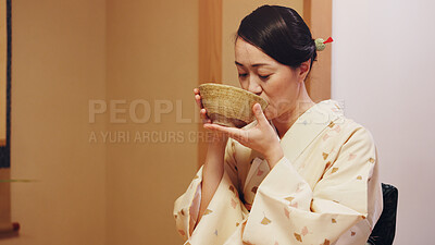 Buy stock photo Woman, ceremony and drink with bowl, chawan and traditional kimono for tea hostess. Japanese ritual, spirituality and mindfulness with cultural outfit for herbal matcha, respect and home hospitality