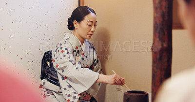 Buy stock photo Japanese woman, tea ceremony and preparation for matcha drink, cultural hospitality or heritage in chashitsu. Traditional ritual, person and beverage process for guests with custom practice in kimono