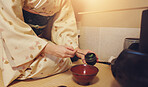 Hands, japanese ceremony and green tea preparation for healthy drink, cultural hospitality and heritage. Traditional ritual, person and matcha powder for herbal beverage process and custom practice