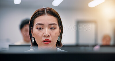 Buy stock photo Serious woman, business and computer for reading, planning or thinking in creative startup. Japanese person, office and inspiration for project, news publication and journalist proofreading article