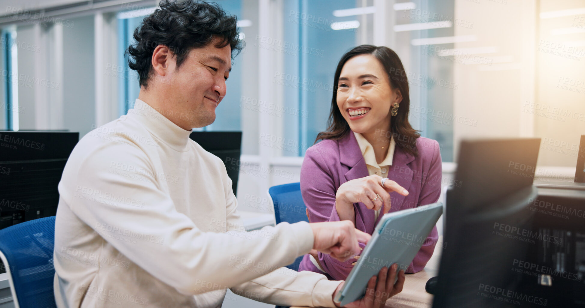 Buy stock photo Collaboration, pointing and tablet with business people in office for creative, design or web development. Feedback, laughing or funny with Japanese man and woman in workplace for discussion