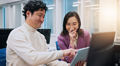 Buy stock photo Laughing, pointing and tablet with business women in office for creative, design or web development. Collaboration, feedback or funny with Japanese man and woman in workplace for online review