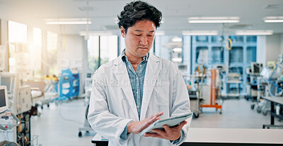 Buy stock photo Man, scientist and reading on tablet at laboratory for medical research, investigation or results on vaccine tests in Japan. Male person, healthcare professional and innovation for drug trial report