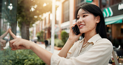 Buy stock photo Phone call, communication and woman in city for vacation, travel or weekend trip with direction board. Happy, cellphone and Japanese female person on mobile conversation for networking o holiday.