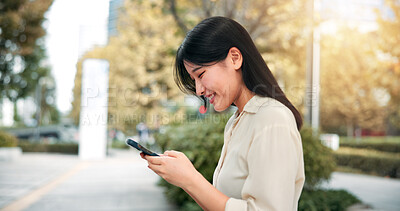 Buy stock photo Digital, city and Asian woman with smartphone, communication and happy with notification and email. Smile, typing and joy for internship, person and travel for work, reading and info in Japan