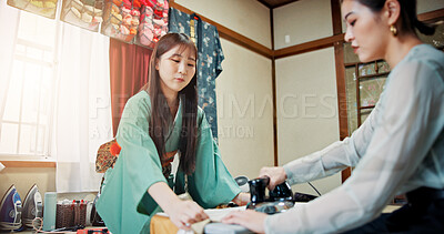 Buy stock photo Design, Kimono and material with Japanese women on floor of home for custom textile manufacturing. Creative, fabric and fashion with people at work as seamstress for tailoring of traditional clothes