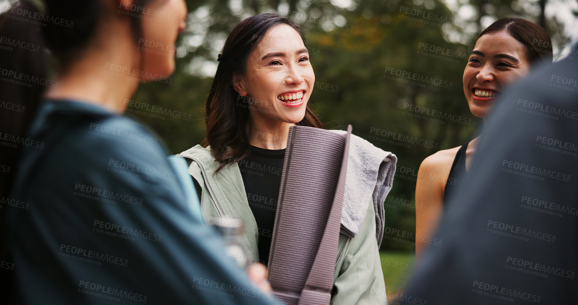 Buy stock photo Outdoor, women and smile with discussion at yoga session for health, self care or support in Japan. Park, people and laugh as friends for joke for fitness, exercise and workout for wellbeing