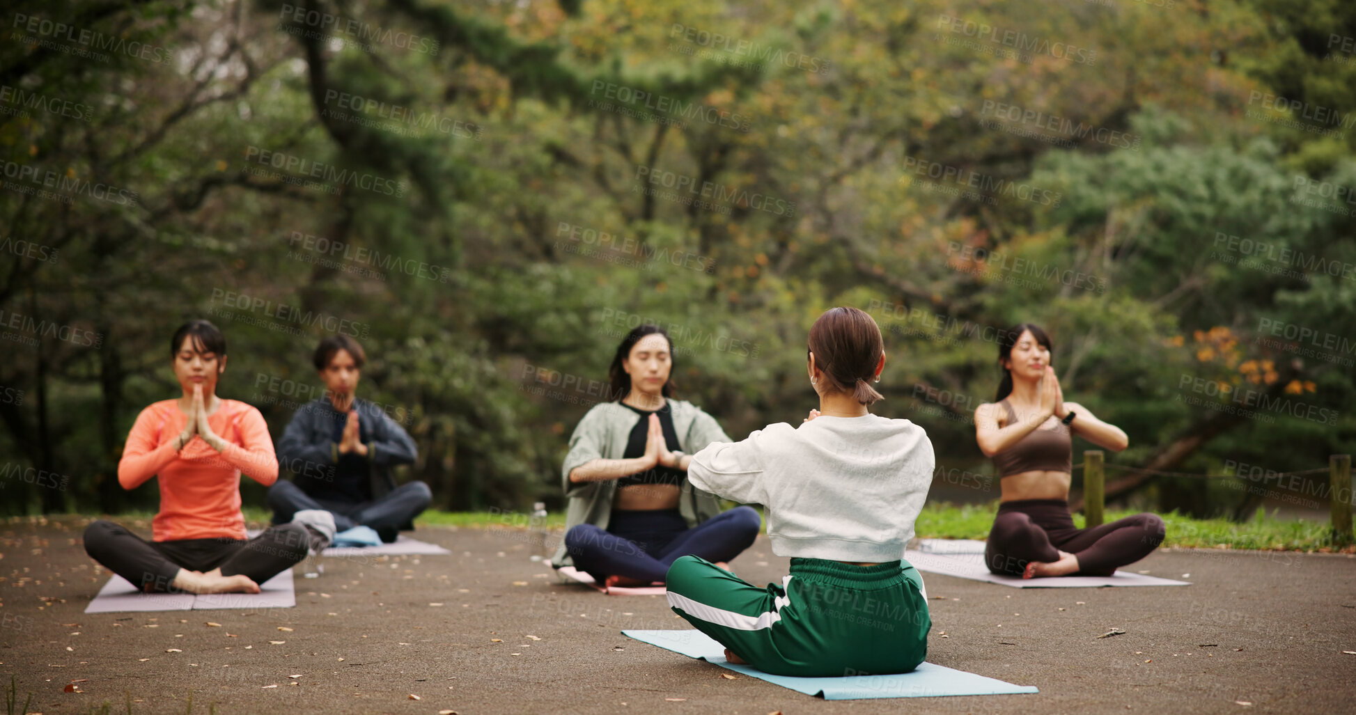 Buy stock photo People, outdoor nature and namaste at yoga class, meditation and support for spiritual wellness. Forest, holistic healing and instructor for fitness in Japan, friends group and chakra mindfulness