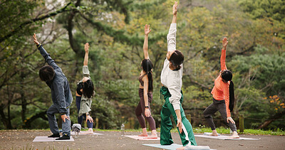 Buy stock photo People, outdoor nature and warrior at yoga class, meditation and support for spiritual wellness. Forest, holistic healing and instructor for fitness in Japan, friends group and balance mindfulness