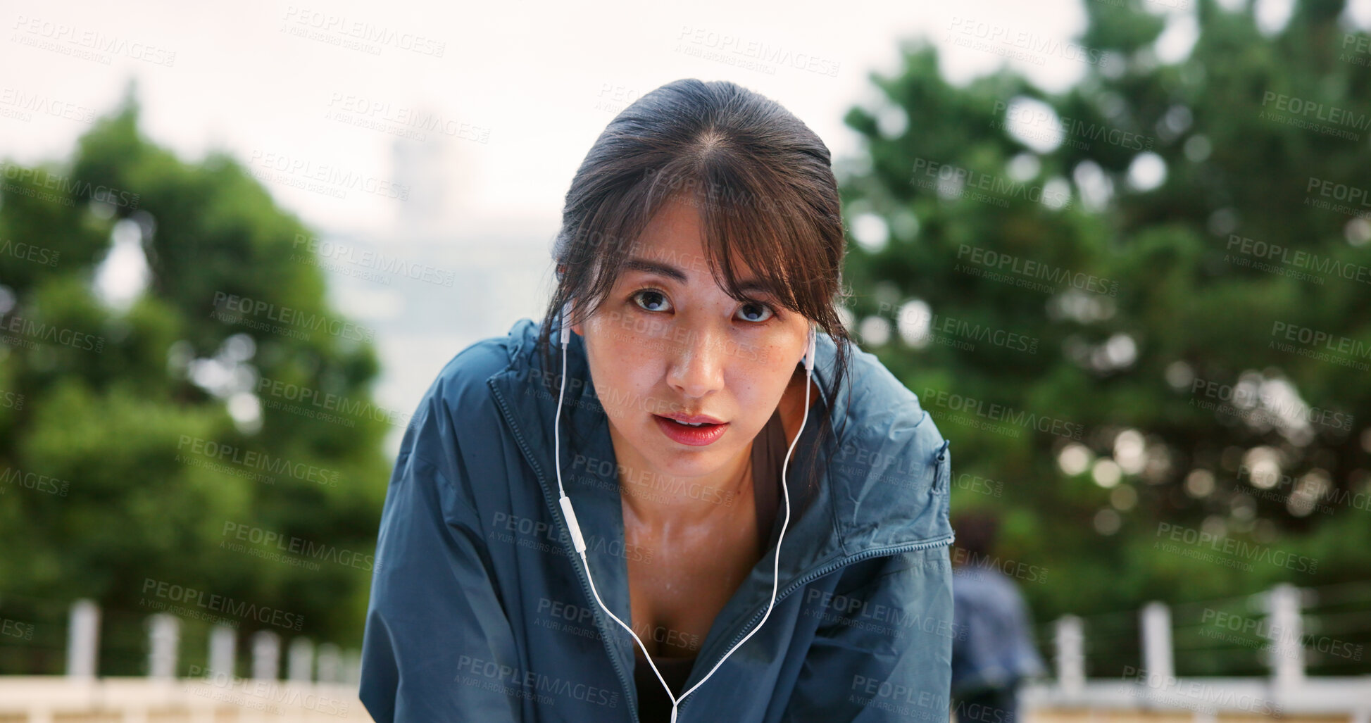 Buy stock photo Portrait, tired and woman for fitness with earphones, sport exercise and listen to music of workout recovery. Female athlete, fatigue and break of cardio training, resting and podcast on Japan bridge