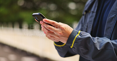 Buy stock photo Cellphone, hands and man outdoor typing email for contact, communication or social networking. Travel, technology and male person on phone for research, connectivity or online media in city in Japan.