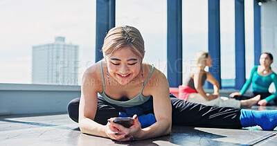 Buy stock photo Dancer, stretch and woman with smartphone in class, browsing social media and typing or watching video. Japanese, influencer and warm up with online, audience and performer communication with fans