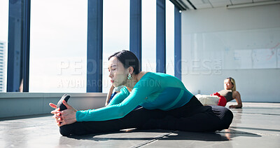 Buy stock photo Dancer, fitness and stretching legs for body health, start or prepare for performance in studio. Warm up, flexibility and Japanese woman exercise back, hamstring muscle and practice on floor in class