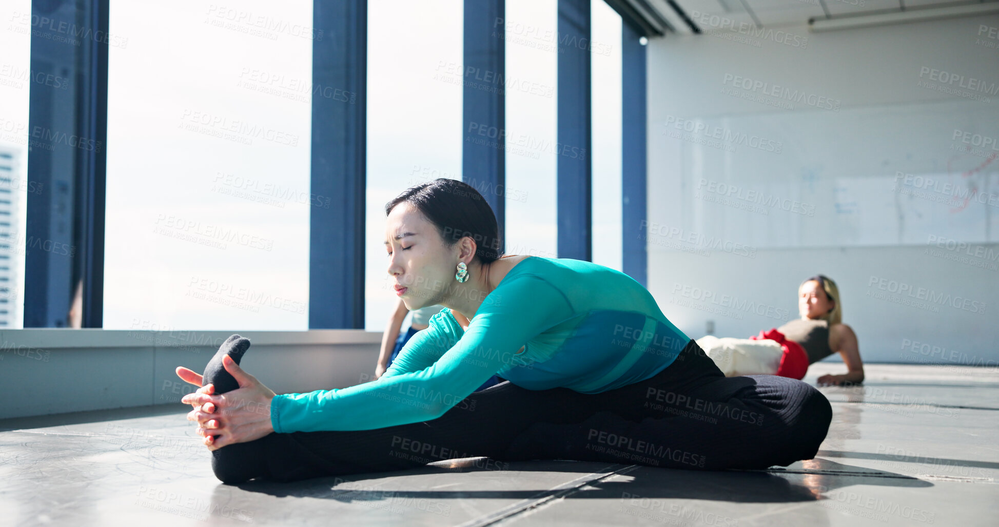 Buy stock photo Dancer, fitness and stretching legs for body health, start or prepare for performance in studio. Warm up, flexibility and Japanese woman exercise back, hamstring muscle and practice on floor in class