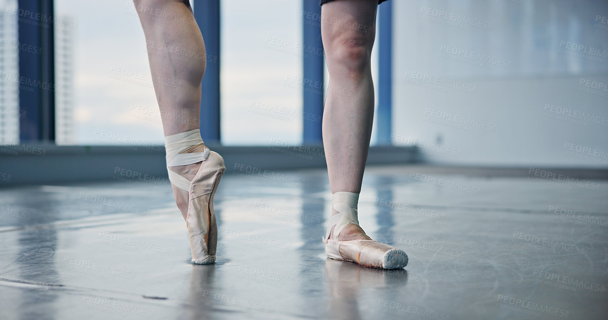 Buy stock photo Ballerina, person and pointe feet in studio for dancing practice, performance rehearsal or recital. Ballet dancer, professional and balance in shoes for competition and talent at Japanese academy