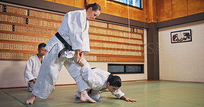 Buy stock photo Karate, self defense and submission with people in dojo for demonstration, fitness or training. Challenge, martial arts or technique with Sensei and student in Japan for combat, fighting or sports