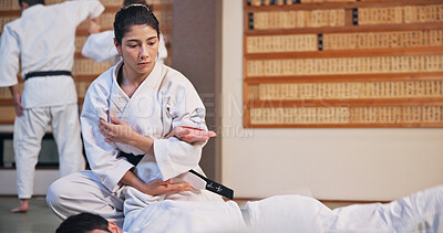 Buy stock photo Karate, martial arts and self defense with people in dojo for demonstration, fitness or training. Challenge, grappling or technique with Sensei and student in Japan for combat, fighting or sports