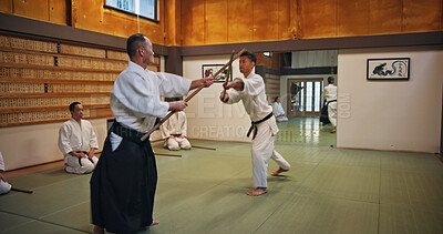 Buy stock photo Action, fitness and training for martial arts, people and sensei with students, fighting and strong. Class, learning and active for self defence, technique and fighter with weapon, samurai and Japan