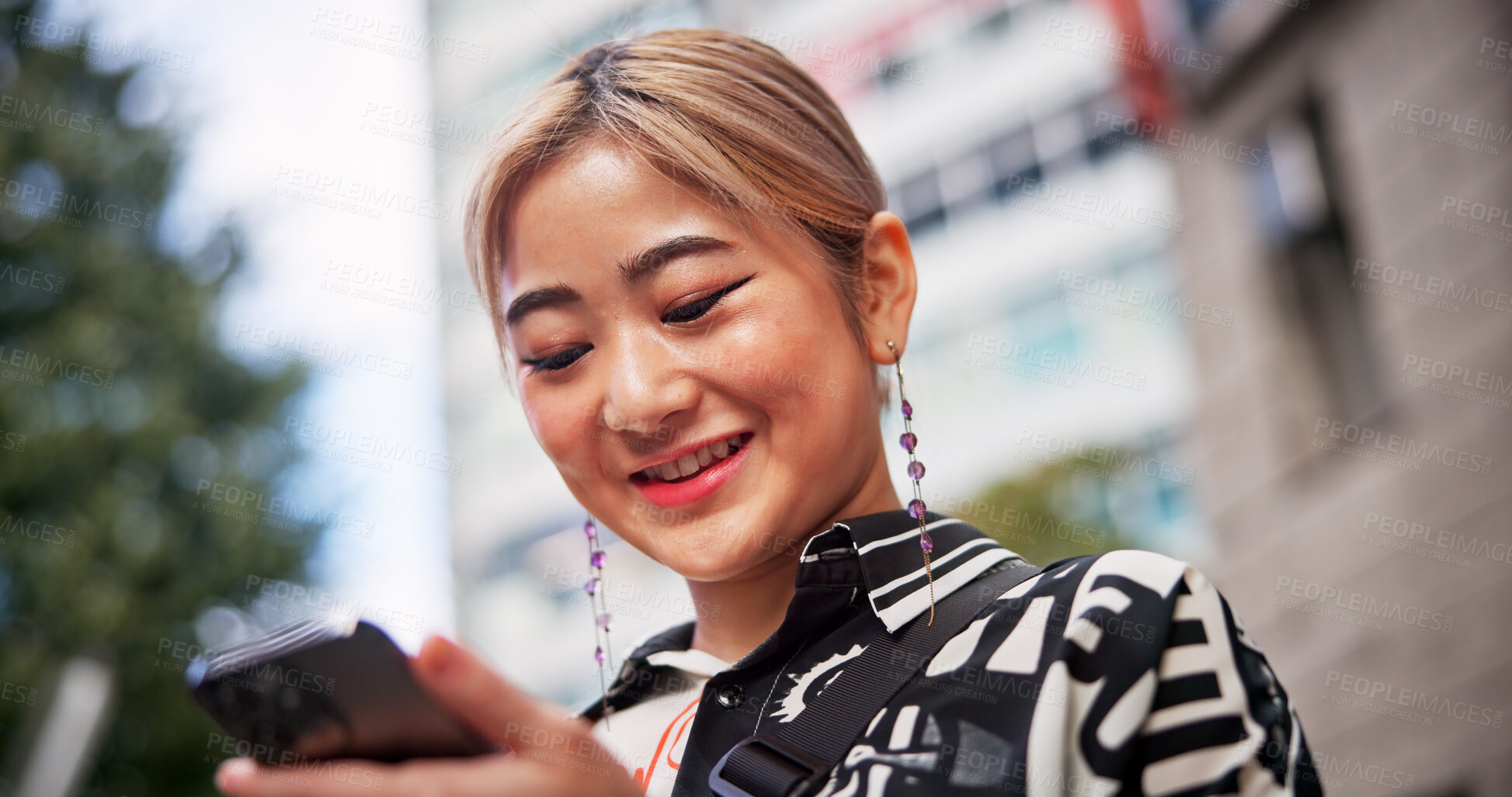 Buy stock photo Japanese, woman and city with smartphone for social media, online communication and search location. Outdoor, female person and traveler with mobile for application, travel or map navigation in Tokyo