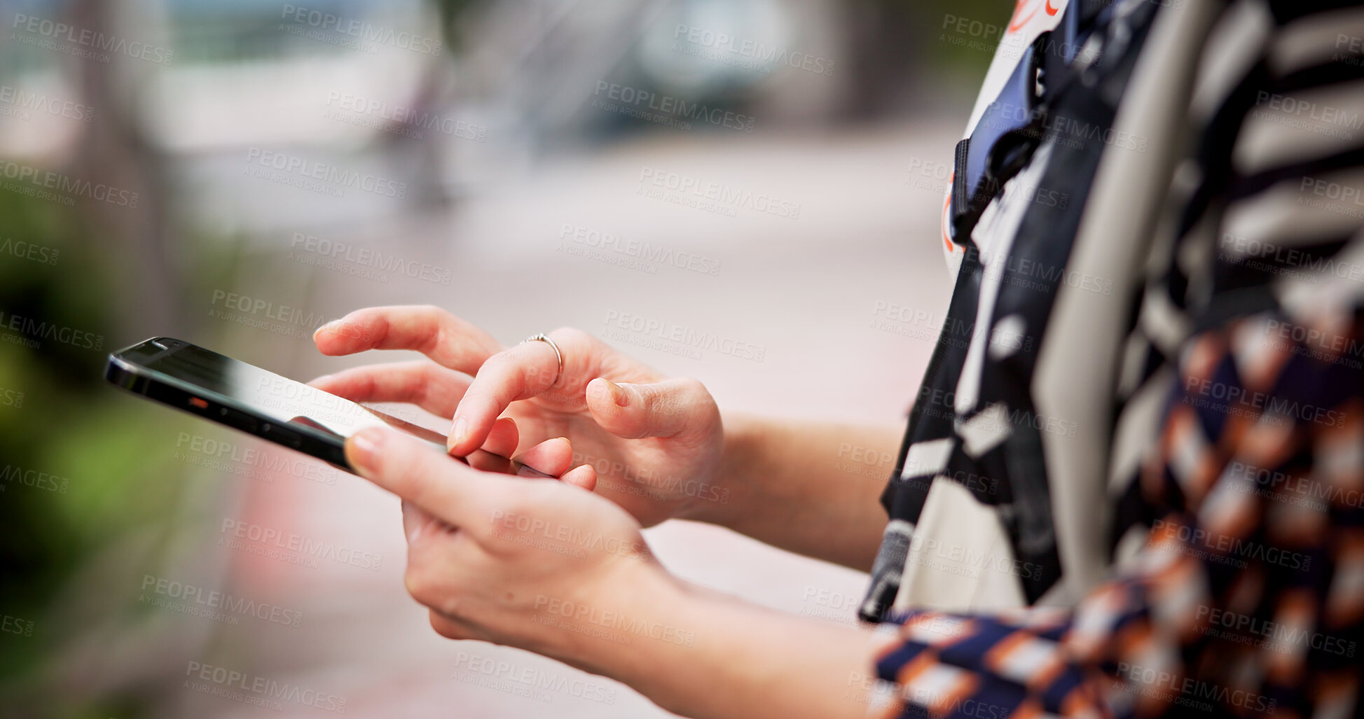 Buy stock photo Person, hands or browsing with phone in city for travel, destination or location app in an urban town. Closeup, Japan or user scrolling on mobile smartphone for tourism, social media or communication