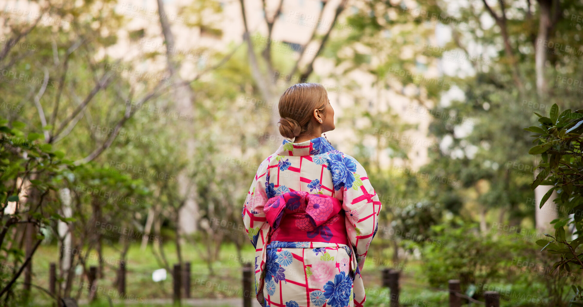 Buy stock photo Back, Kimono and walking with woman in park to explore green location for sightseeing or tourism. Fashion, nature and travel with person in conservation park of Japan for culture, holiday or vacation