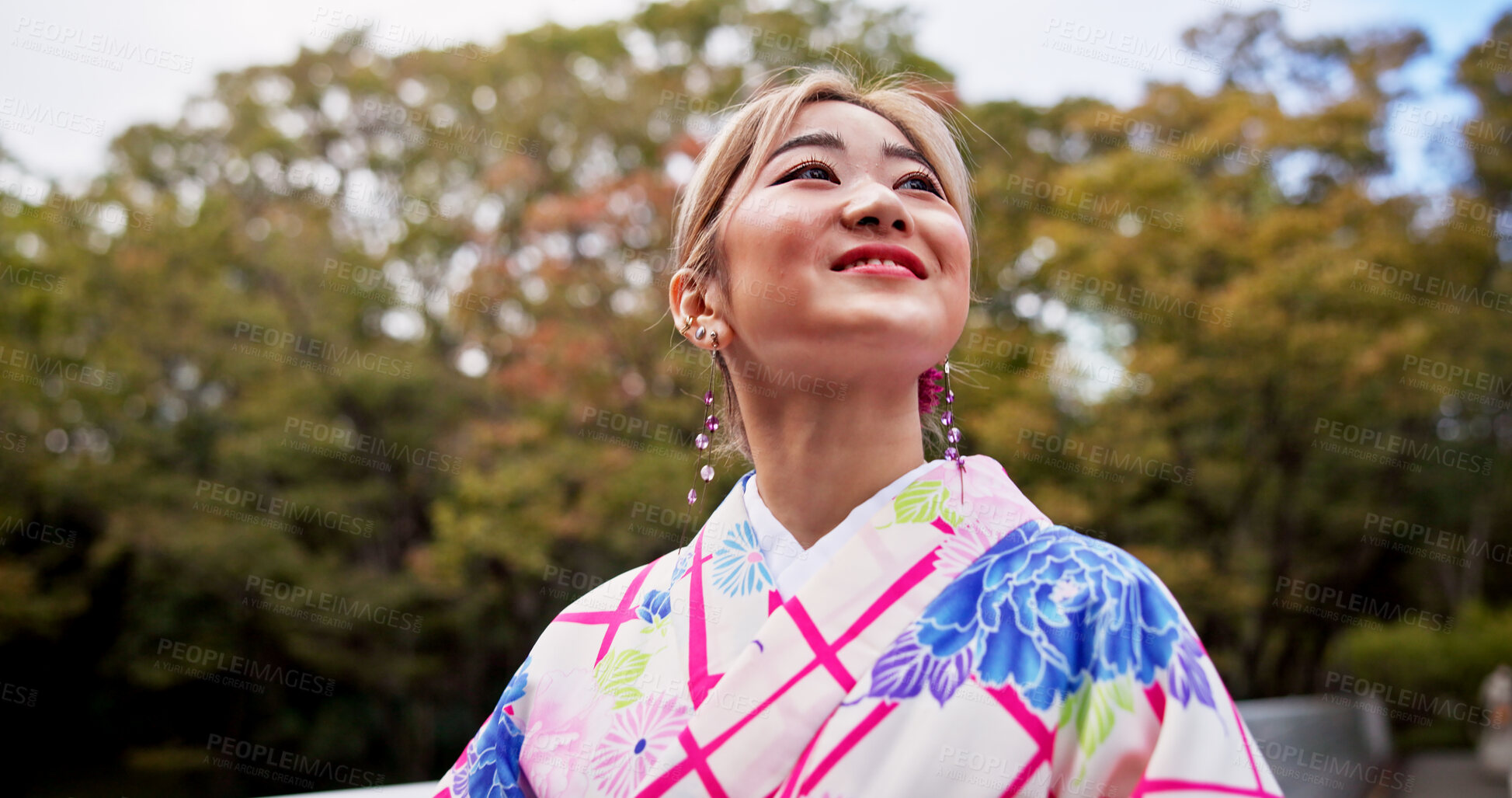 Buy stock photo Happy, asian woman and dream with fashion in kimono for travel, ambition or sightseeing in nature. Japan, female person or tourist with smile or outfit for tradition, culture or heritage at park