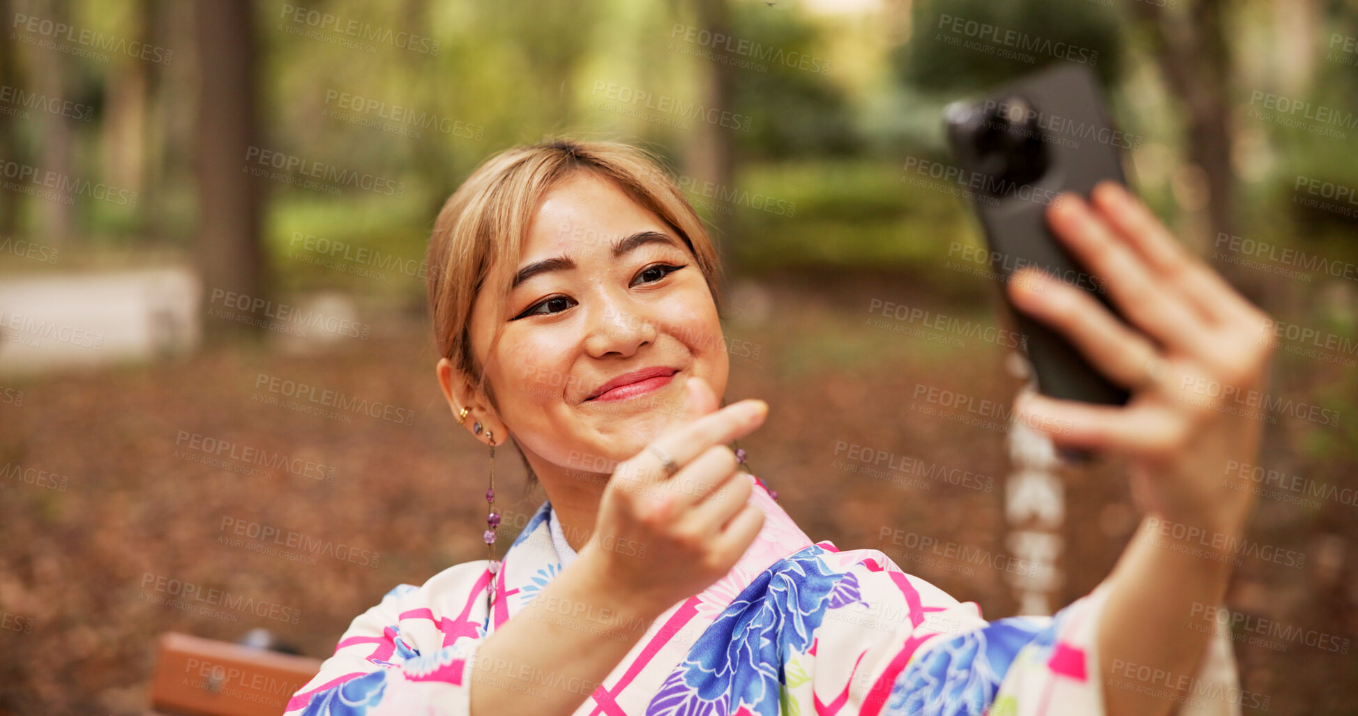 Buy stock photo Selfie, travel and woman in nature, gesture and happy for memory on vacation, smile and kimono. Outdoor, photography and profile picture of Asian person, digital and photo for social media in Japan