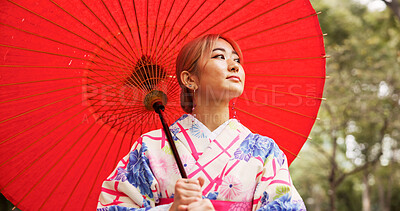 Buy stock photo Park, umbrella and Japanese woman with kimono, thinking and urban travel with idea. Street, fashion and parasol with walking, outdoor and journey with smile, style and traditional Asian dress