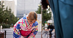 Bow, respect and woman in city for welcome, greeting and tradition with kimono. Japanese people, farewell and urban Tokyo street with heritage custom and cultural robe in town for departure farewell