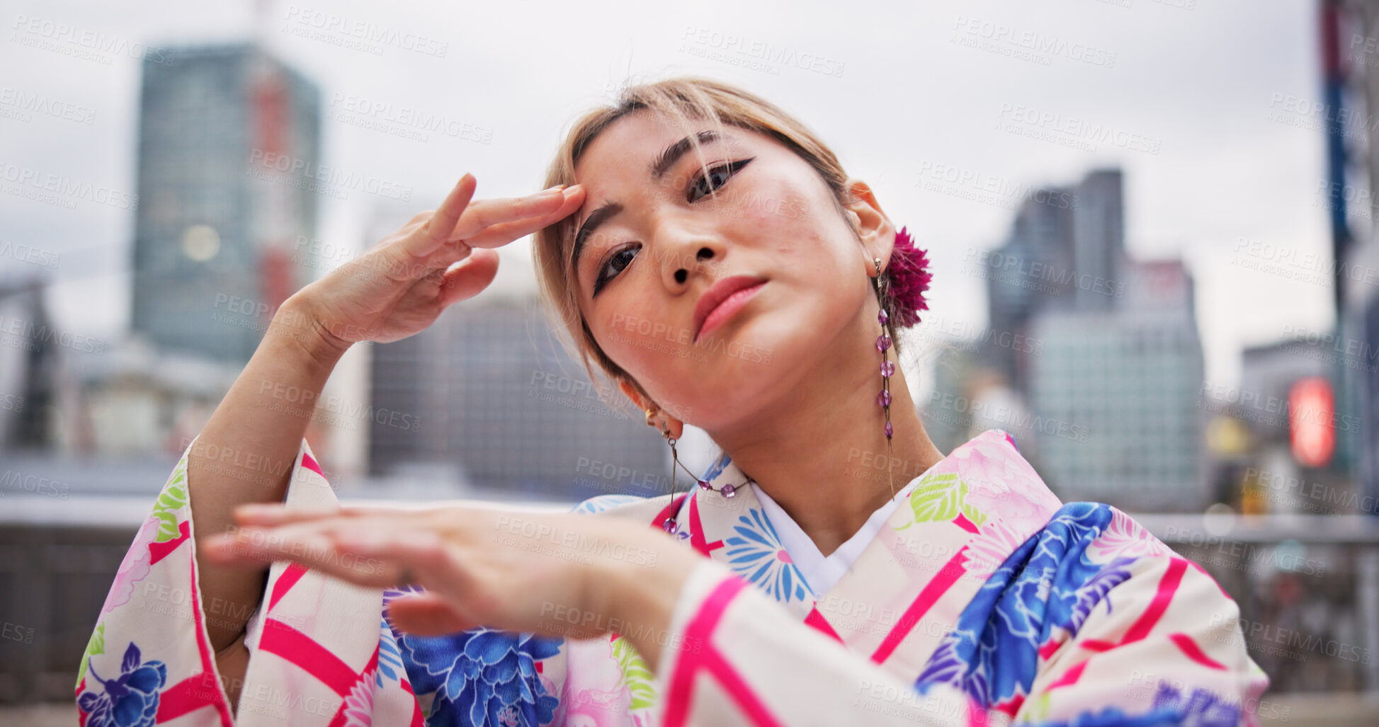 Buy stock photo Japanese woman, culture and dance with kimono in city for hand movement, contemporary style and expression. Outdoor performer, portrait and nihon buyo with traditional fashion, urban town or heritage