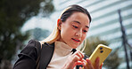 Business woman, texting and phone in city with contact, reading and networking for legal career in street. Person, happy and corporate lawyer with smartphone for notification, deal or travel in Japan