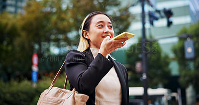 Buy stock photo Business woman, speakerphone and travel in city with thinking, memo or networking for legal career. Person, phone call and corporate lawyer for voice notes, chat or happy on commute to work in Japan