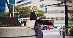 Tablet, city and Japanese woman with morning commute, smile and tech of lawyer with email. Online, digital and professional from taxi app for urban travel to work with website and trip in Tokyo