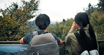 Buy stock photo Outdoor, couple and bridge with nature for hiking, sightseeing or adventure in Japan. Relationship, people and back view with exploring on trip, travel and holiday in countryside on break for bonding