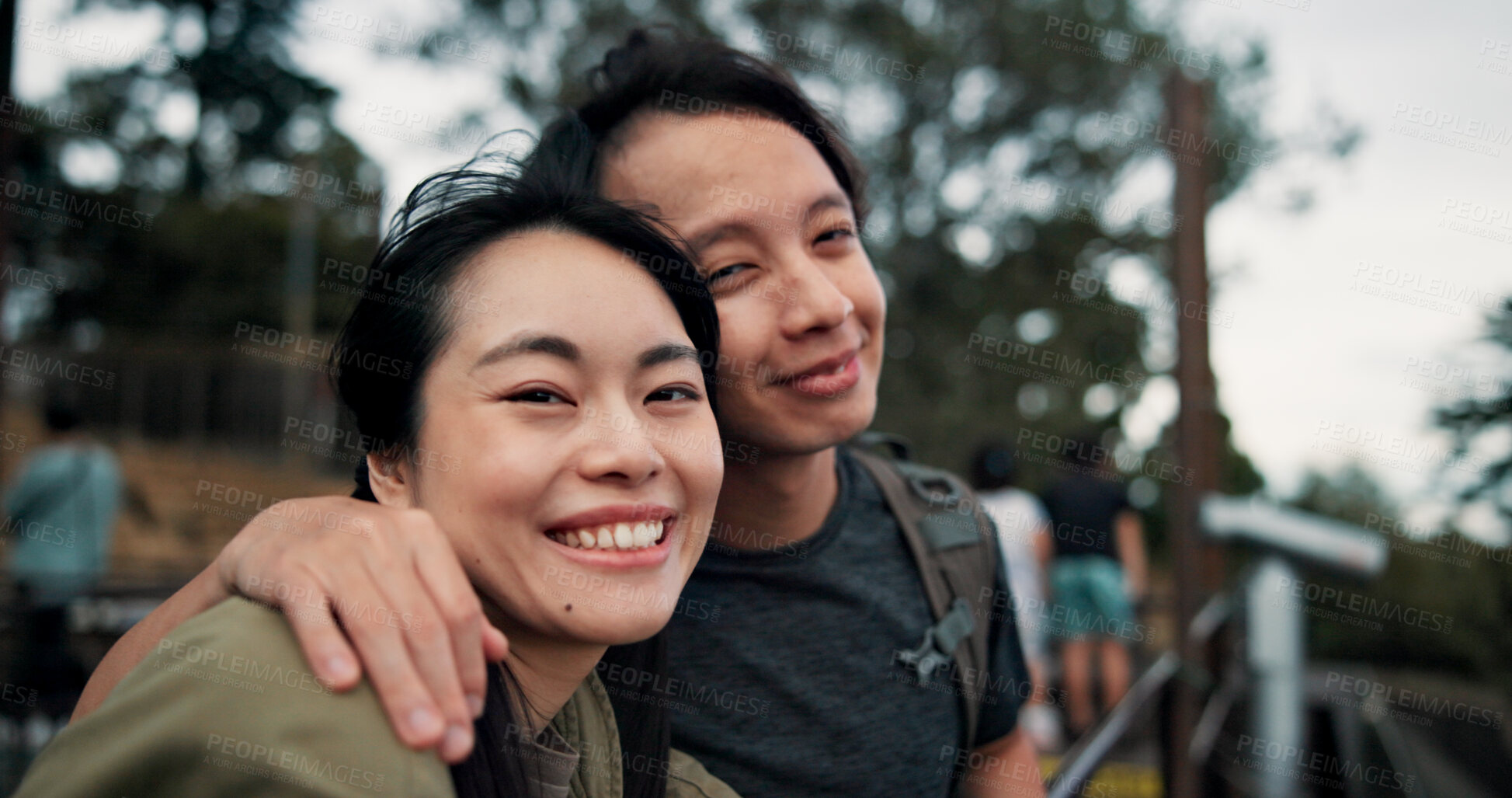 Buy stock photo Hug, romance and smile with couple in nature for holiday, travel or vacation on mountains of Japan. Anniversary, honeymoon and smile with Japanese people outdoor on Mount Takao together for dating