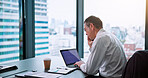 Business, man and research with laptop at office on internet  for market evaluation for company growth in Japan. mature person, employee and serious with reading information for strategy as economist