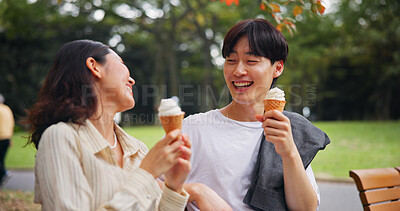 Buy stock photo Couple, date and laugh in park with ice cream, bonding and share memories in Osaka. Japanese people, happy and outdoor with dessert snack for relationship development, funny story or travel with love