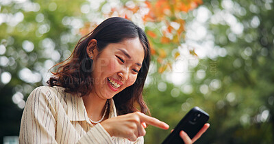Buy stock photo Woman, happy and outdoor with phone for social media, good news and online shopping deal in Tokyo. Japanese girl, mobile and smile in park for ecommerce promotion, app notification and connectivity