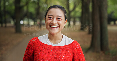 Buy stock photo Portrait, smile and Japanese woman in park with trees, happiness and comfort for autumn fashion. Confidence, vacation and girl with stylish sweater, joyful environment and countryside with plants
