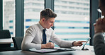 Employee, man and tablet in boardroom with paperwork for company growth as business development manager. Office, people and serious on internet for report or feedback on sales and strategies