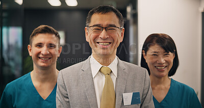 Buy stock photo Portrait, doctors and business with Japanese man in hospital for leadership, teamwork and healthcare study. Medical, solidarity and smile with people and investor for partnership and consulting