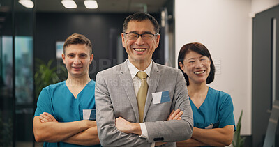 Buy stock photo Portrait, doctors and investor with Japanese man and arms crossed in hospital for leadership, teamwork and healthcare. Medical, solidarity and smile with people for partnership and consulting