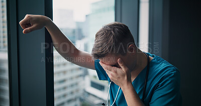 Buy stock photo Stress, man and doctor in hospital with healthcare mistake, crisis or fail in treatment plan. Upset, burnout and male medical worker crying with grief for patient loss in surgery at clinic in Japan.