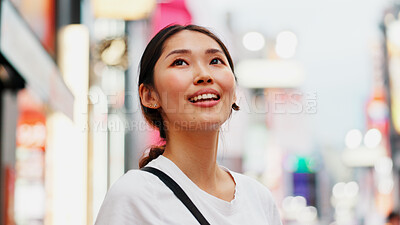 Buy stock photo Japanese woman, view and city with travel, outdoor and sightseeing with smile from thinking. Happy, holiday and idea for vacation and urban journey in Tokyo with town trip and adventure break