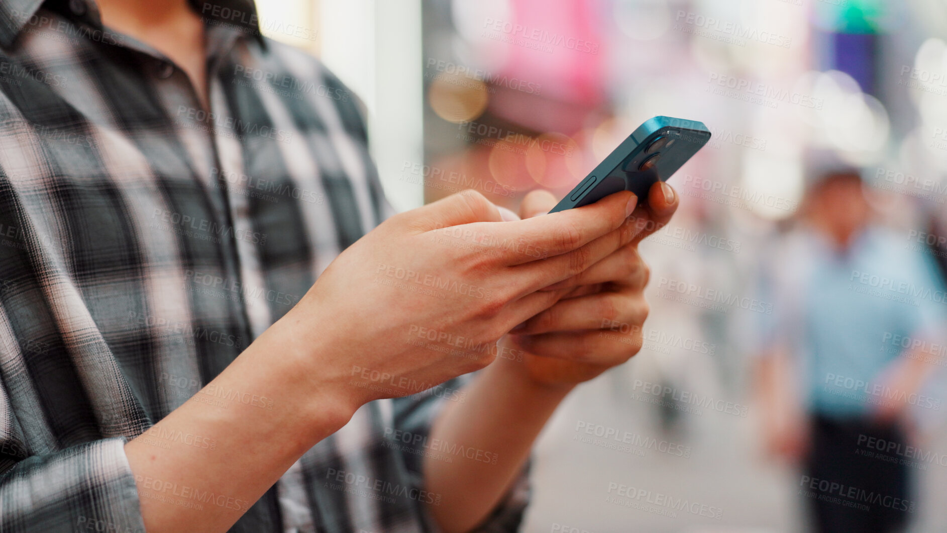 Buy stock photo Hands, phone and person typing in city to check text, social media or blog post on account in Japan. Closeup, mobile or online outdoor for communication, notification or download chat app on internet