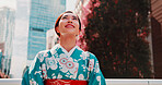 City, smile and girl with kimono, thinking and outdoor sightseeing adventure in traditional fashion. Urban culture, identity and woman in Japanese clothes, happy face and morning travel in low angle