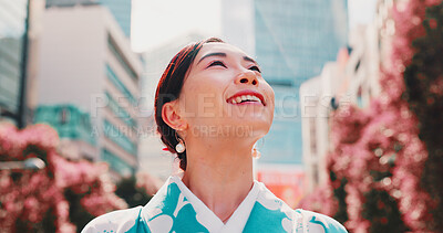 Buy stock photo City, smile and face of girl with kimono, thinking or sightseeing adventure in traditional fashion. Urban culture, identity and woman in Japanese clothes, happy morning travel or commute in low angle