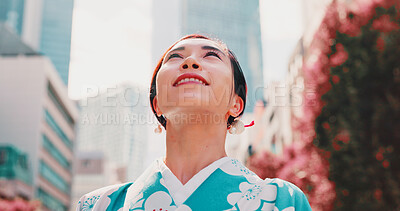 Buy stock photo City, smile and face of woman with kimono, thinking and sightseeing adventure in traditional fashion. Urban culture, identity and girl in Japanese clothes, happy ideas and morning travel in low angle