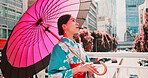 Urban, umbrella and woman in kimono walking on bridge with thinking, morning travel or sightseeing adventure. Fashion, spring and Japanese girl with traditional clothes, parasol or culture in city